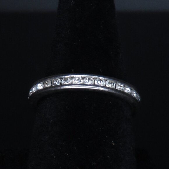Silver Tone Infinity Band with Clear Stones - Picture 1 of 3